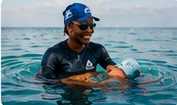 Illustrative instructor helping swimmers in the ocean